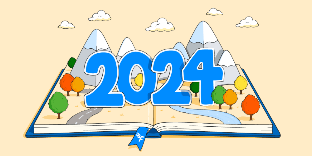 open pop-up book with mountains and autumnal trees opens up to a big 2024 sign